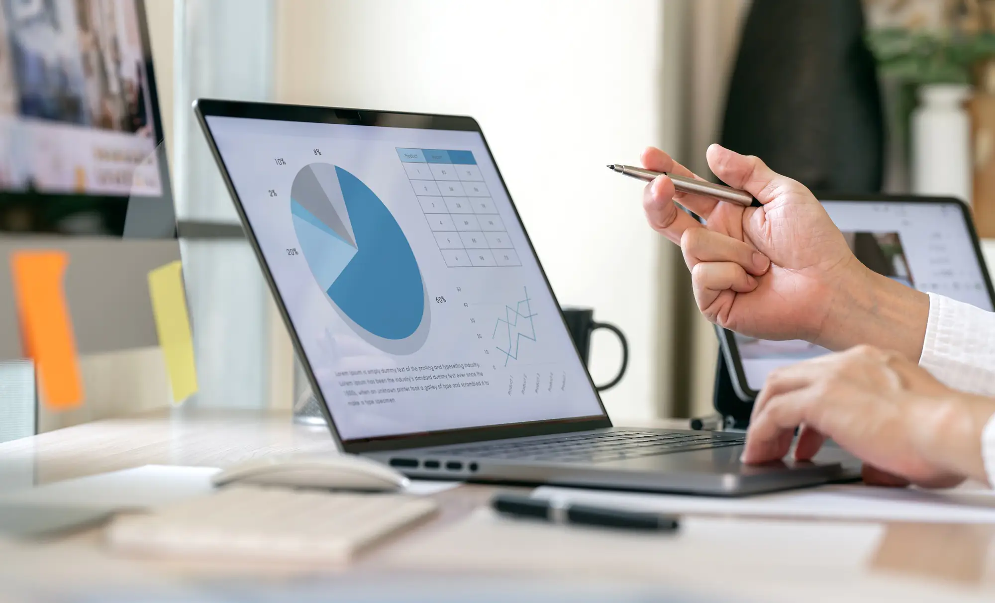 Businessman using laptop computer analyze business growth graph and Marketing strategy planning
