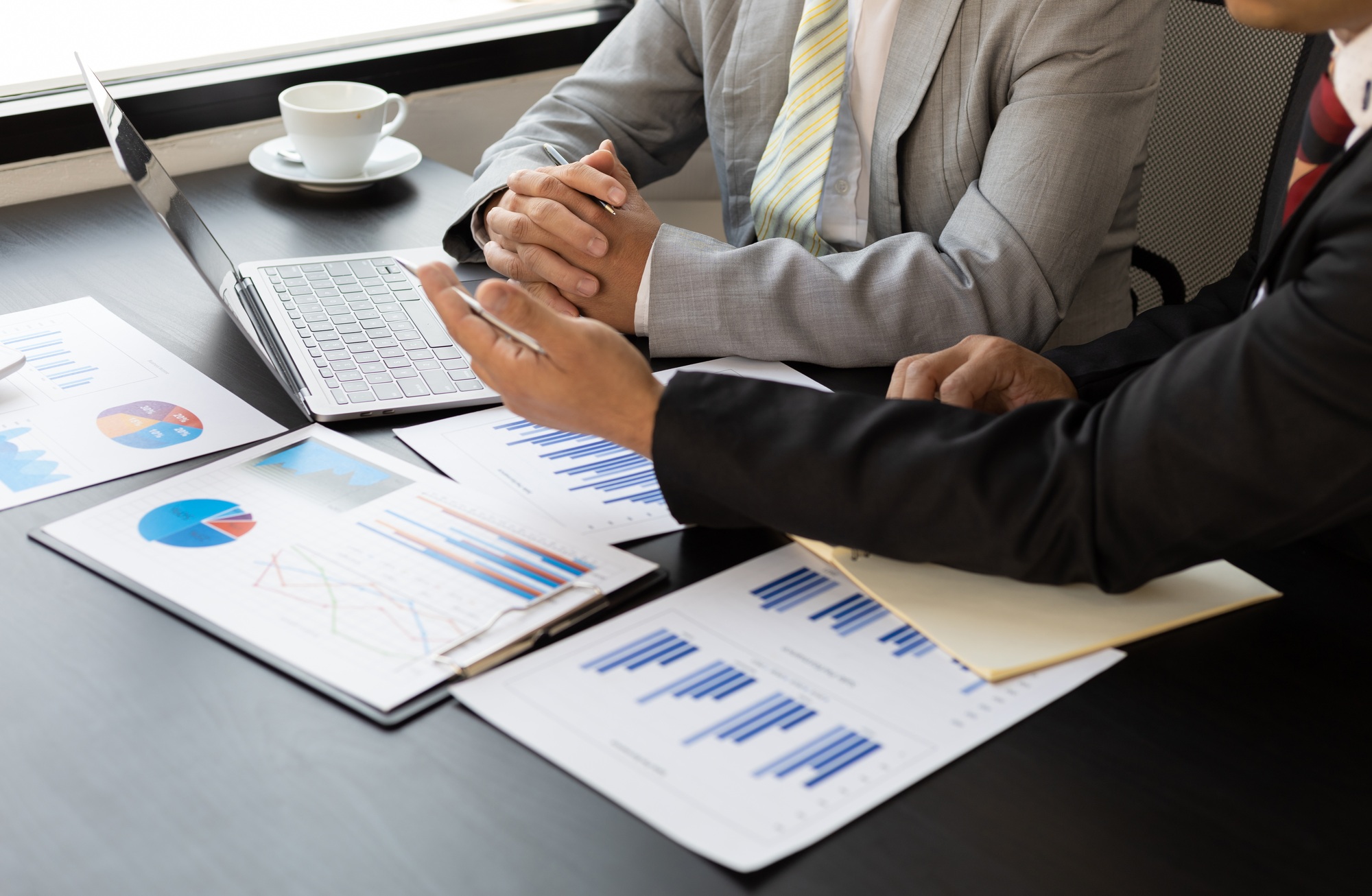 Financial business consulting meeting, business investment strategy planning.