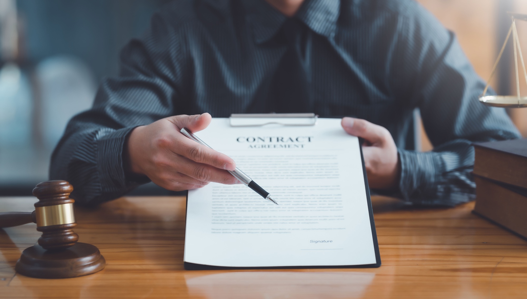 Lawyer man working in the office. Law, legal services, advice, justice and law concept.